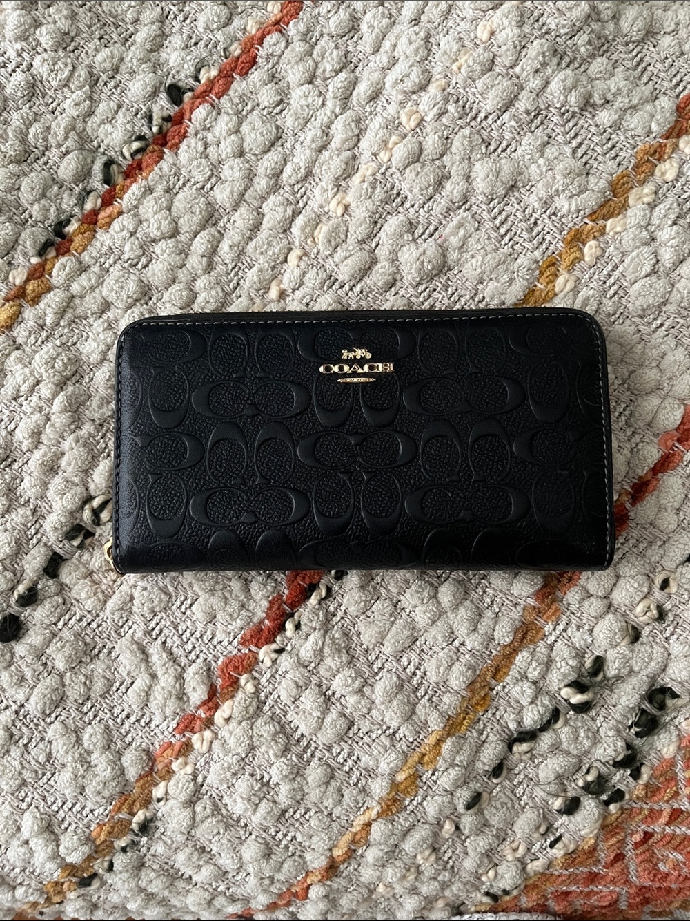 COACH Black Embossed Signature Zip-Around Wallet with Gold Logo